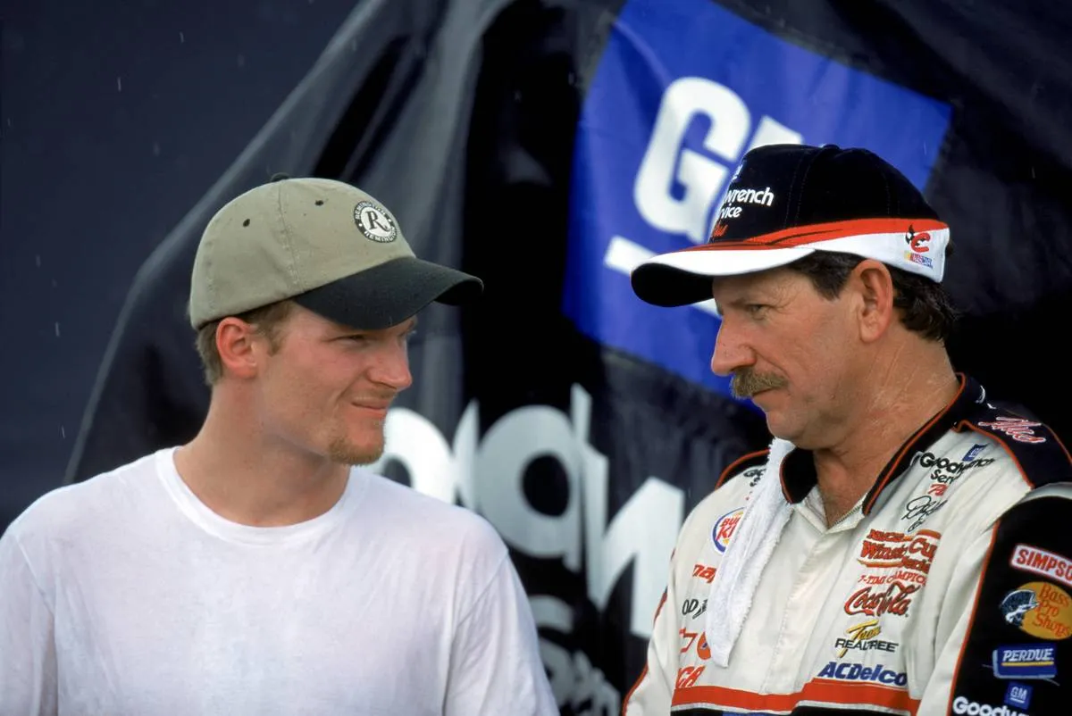 Earnhardts Jr. and Sr. pose for a photograph