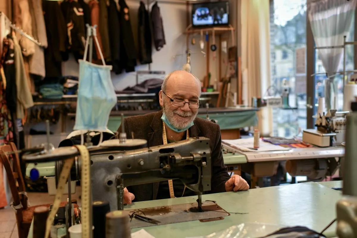 old-man-sews-in-his-atelier-2022-11-10-18-29-47-utc