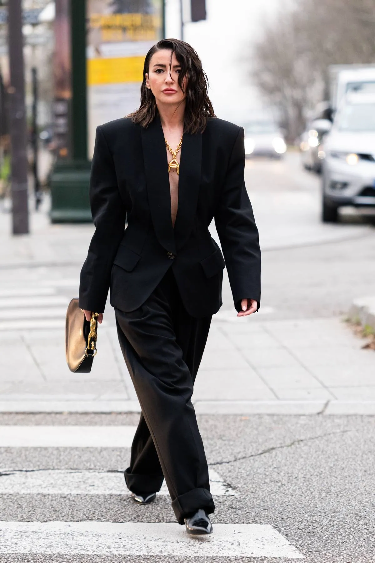 PARIS, FRANCE - JANUARY 24: Alexandra Pereira wears a black suit with oversize blazer and black bag, outside Alexandre Vauthier, during Paris Fashion Week - Menswear Fall-Winter 2023-2024, on January 24, 2023 in Paris, France. (Photo by