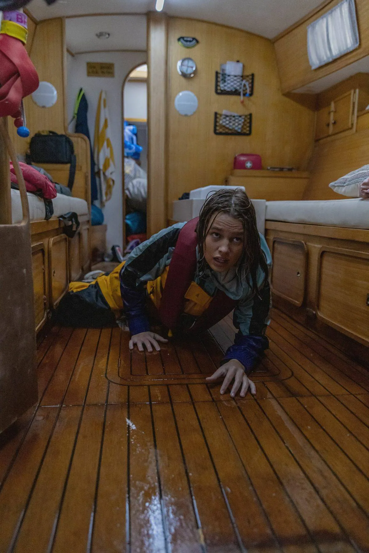 Teagan Croft crawling across ship hold floor as Jessica Watson in True Spirit