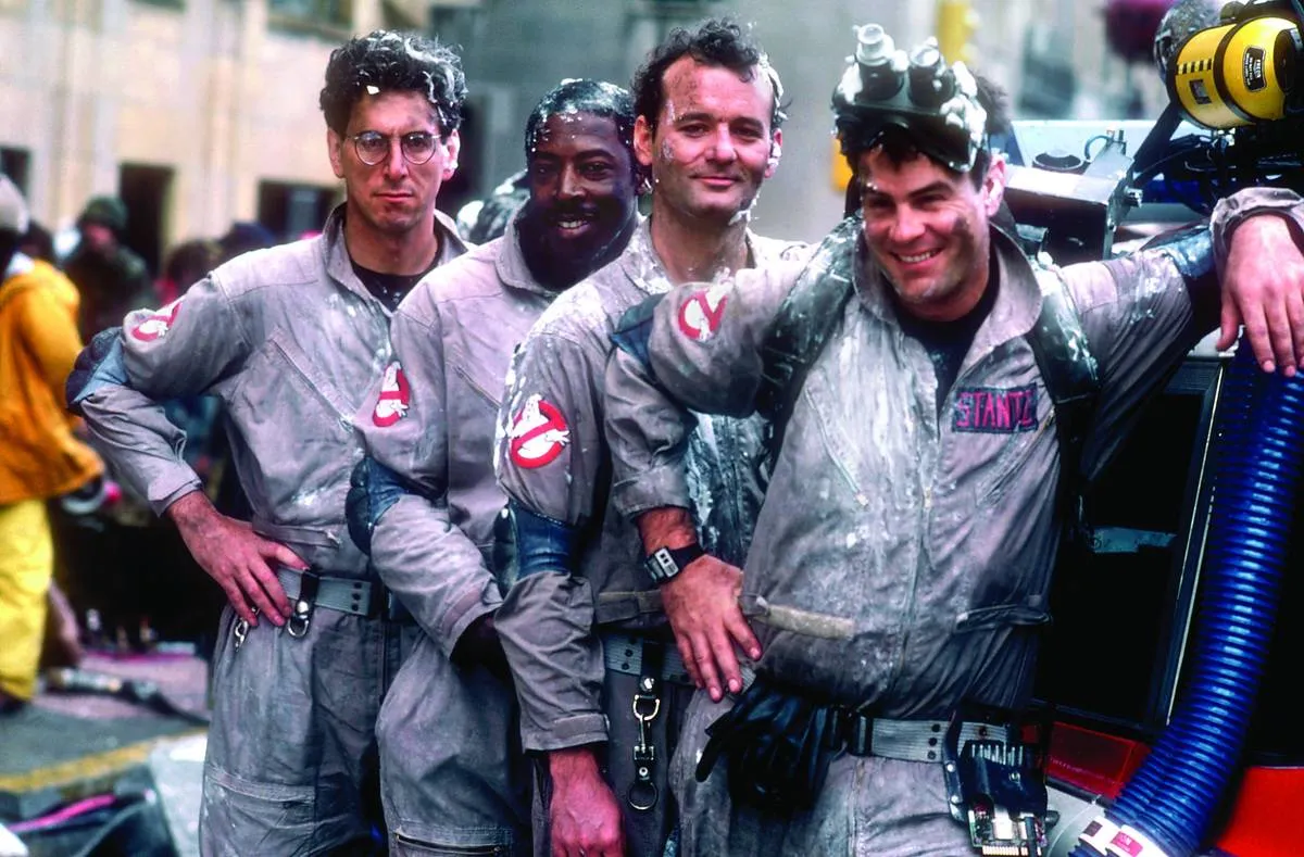 cast of ghostbusters in their costumes