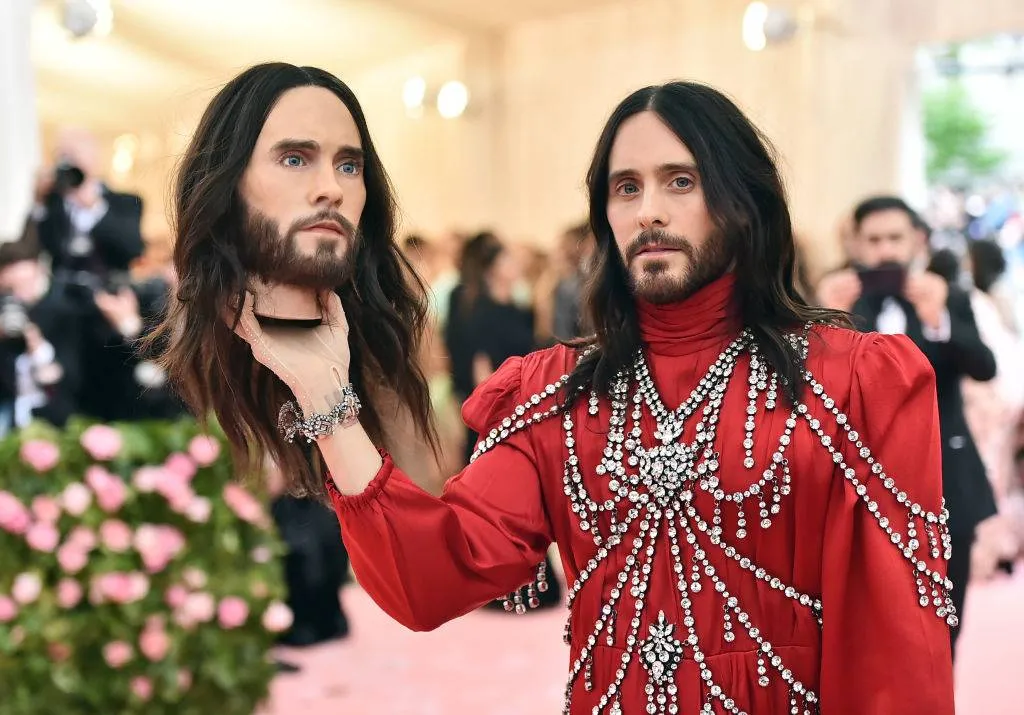 jared leto holding a model of his head