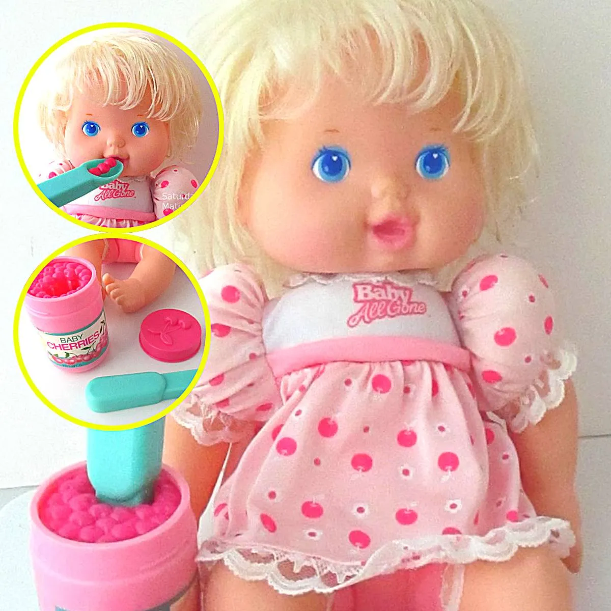 doll dressed in a pink outfit getting fed 