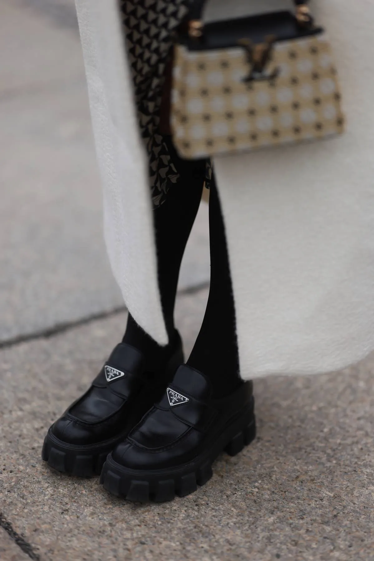 Prada black leather loafer, Edited asymmetrical black and white pattern skirt, 