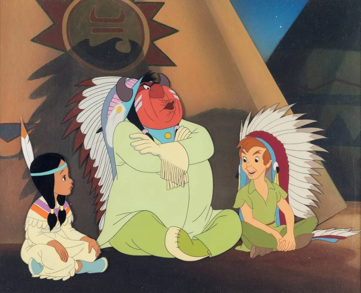 Tiger Lily and her father sitting next to Peter Pan in Native American headdress