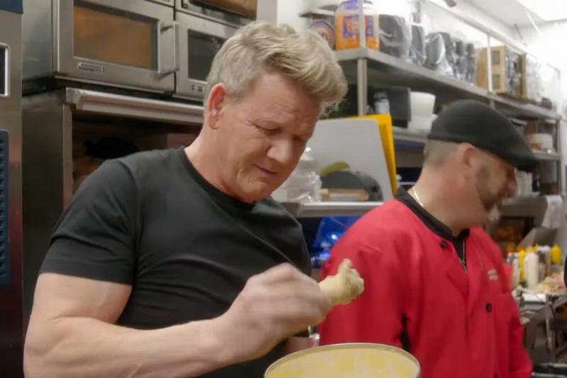 Gordon Ramsay inspecting unsatisfactory food in Kitchen Nightmares