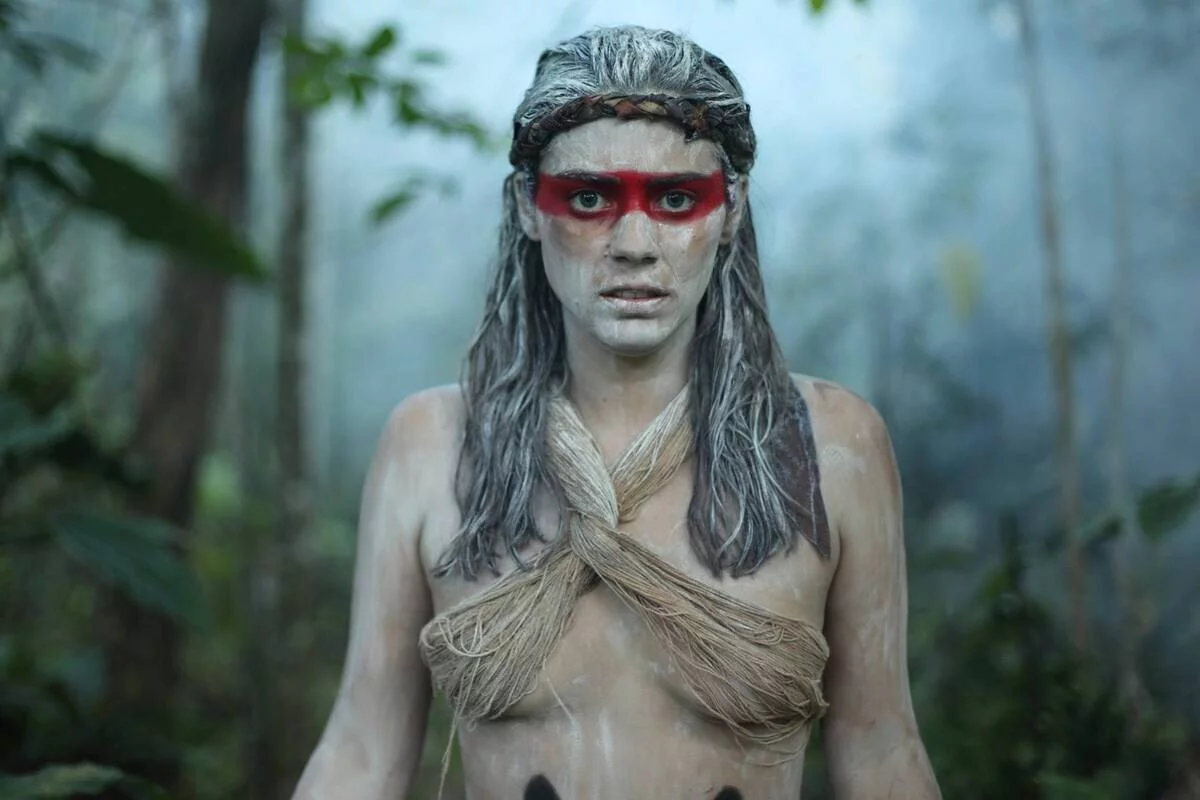 woman with paint on hair and face